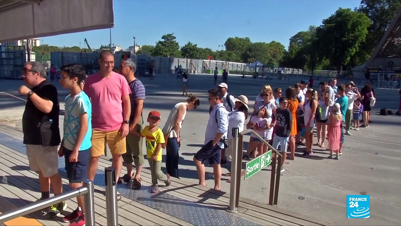 Eiffel Tower closed for second day at height of...