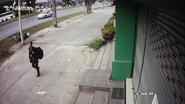 Out-of-control truck crashes into shops and parked cars