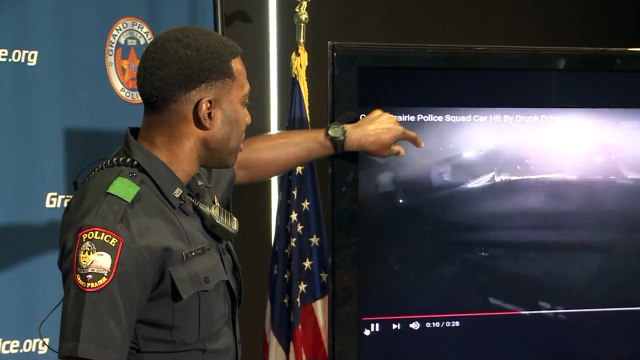 Alleged Drunk Driver Slams Into Police Car While Officers Are Fixing Flat Tire