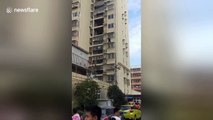 Hero cop rescues boy hanging from fifth-floor window