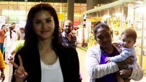 Sunny Leone With Her Kid Spotted At Mumbai Airport