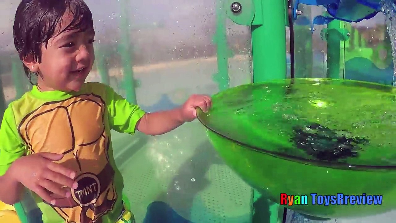 PLAYING AT THE WATERPARK Splash Pad