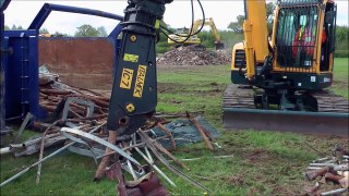 Excavator with demolition shears close up