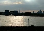 Police Boats Pursue Jet Skis Along the River Thames