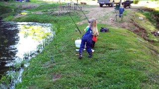 little girl catches big fish
