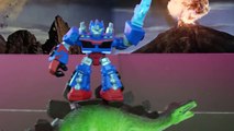 Dinosaur toys battling Rescue Bots Transformers toys