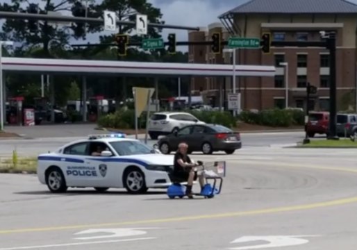 Police Follow Man Driving Motorized Shopping Cart on South Carolina Road