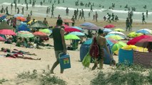 Residents of Portuguese town attempt to keep cool in heatwave