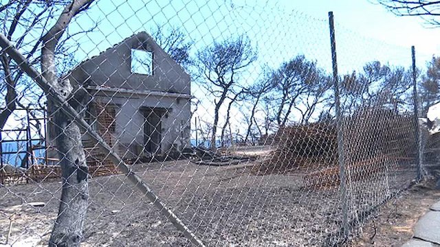 Greece fire: relatives of victims demand answers