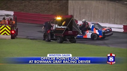 Police Officer Points Gun at Driver During Racing Conflict at North Carolina Stadium