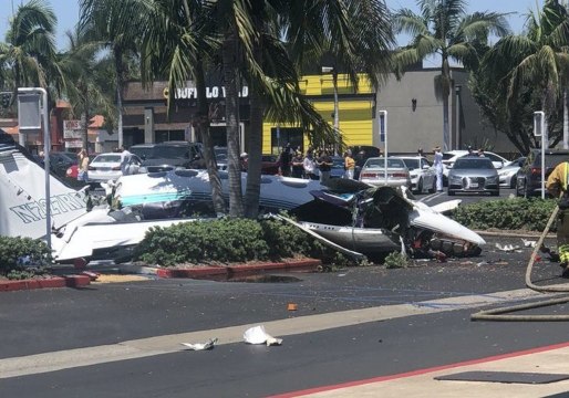 Bystanders Watch as Rescuers Search Wreckage of Santa Ana Plane Crash