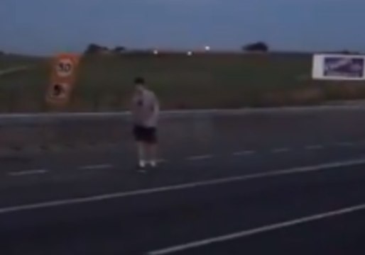 Family Plays Football in Middle of Motorway During Severe Traffic Congestion