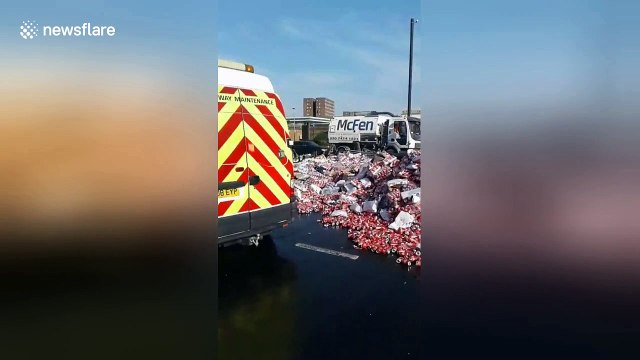 Major UK road closed after lorry crash sends thousands of Coke cans onto road