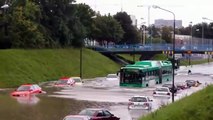 The bus is going through the water, it looks like Running through the river
