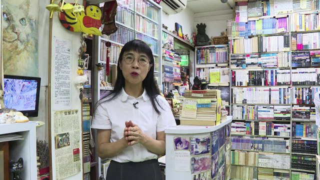 Títulos raros y compañía felina en librería de Hong Kong