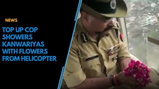 Watch: ADG of UP police throws flowers at Kanwariyas from helicopters