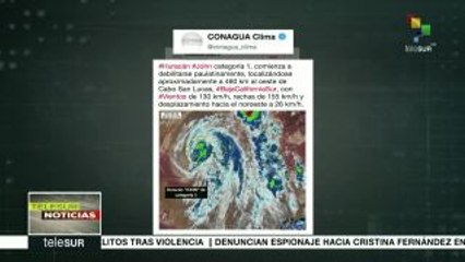 México: huracán "John" se debilita y se espera que no toque tierra