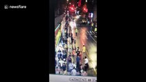 Terrifying scene as billboard collapses on top of pedestrians killing three