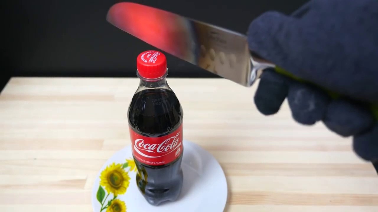EXPERIMENT Glowing 1000 degree KNIFE VS COCA COLA
