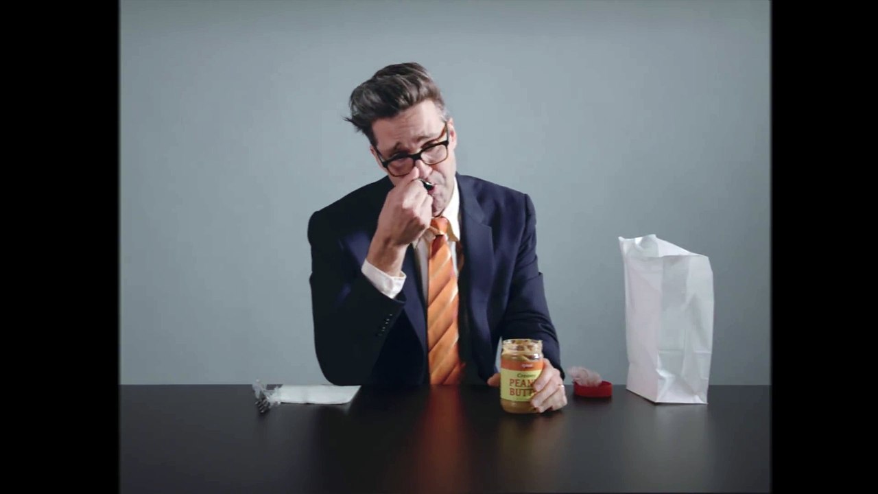 Man Eats Peanut Butter