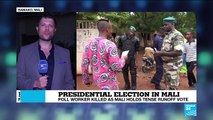 Malians vote in presidential runoff amid attacks, threats
