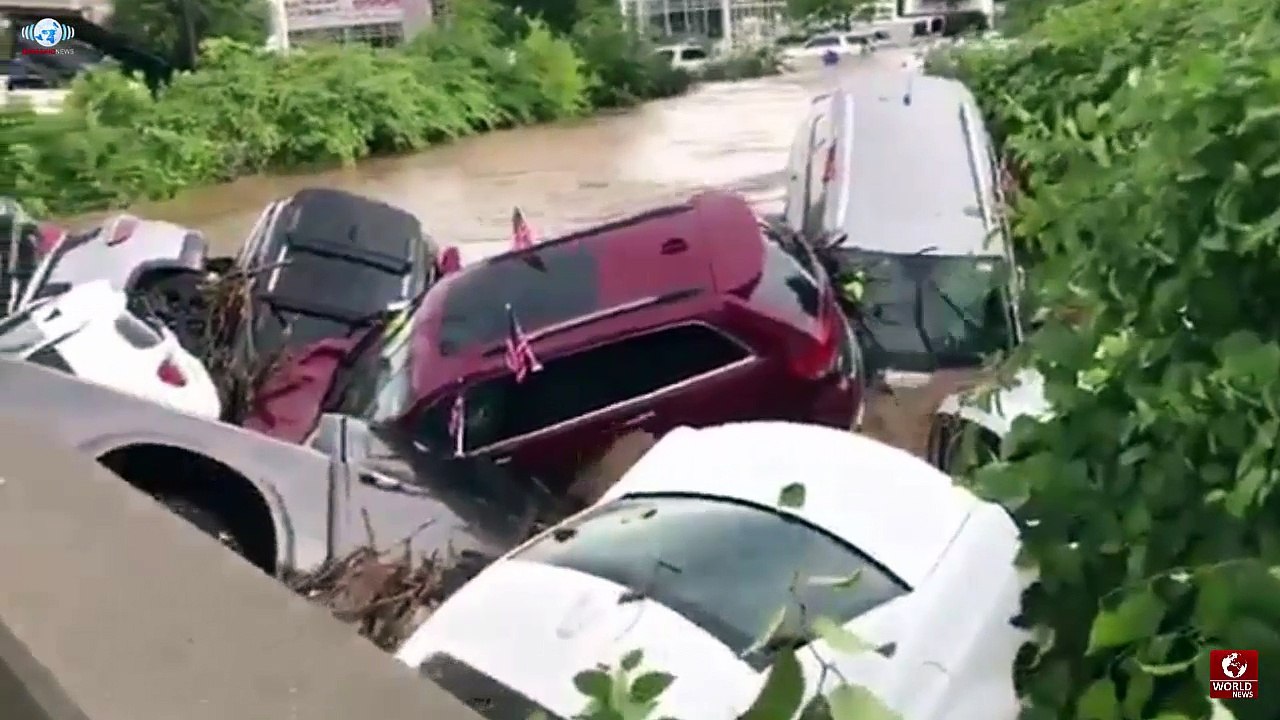 Cars swept off dealership lot by flooding in New Jersey