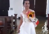 Bride Wades Through Flooded Church Aisle in Aftermath of Monsoon
