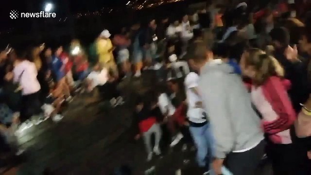 Chaotic scenes at Spanish music festival after hundreds injured in pier collapse