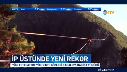 422 metre yüksekte gözleri kapalı 26 dakika yürüdü