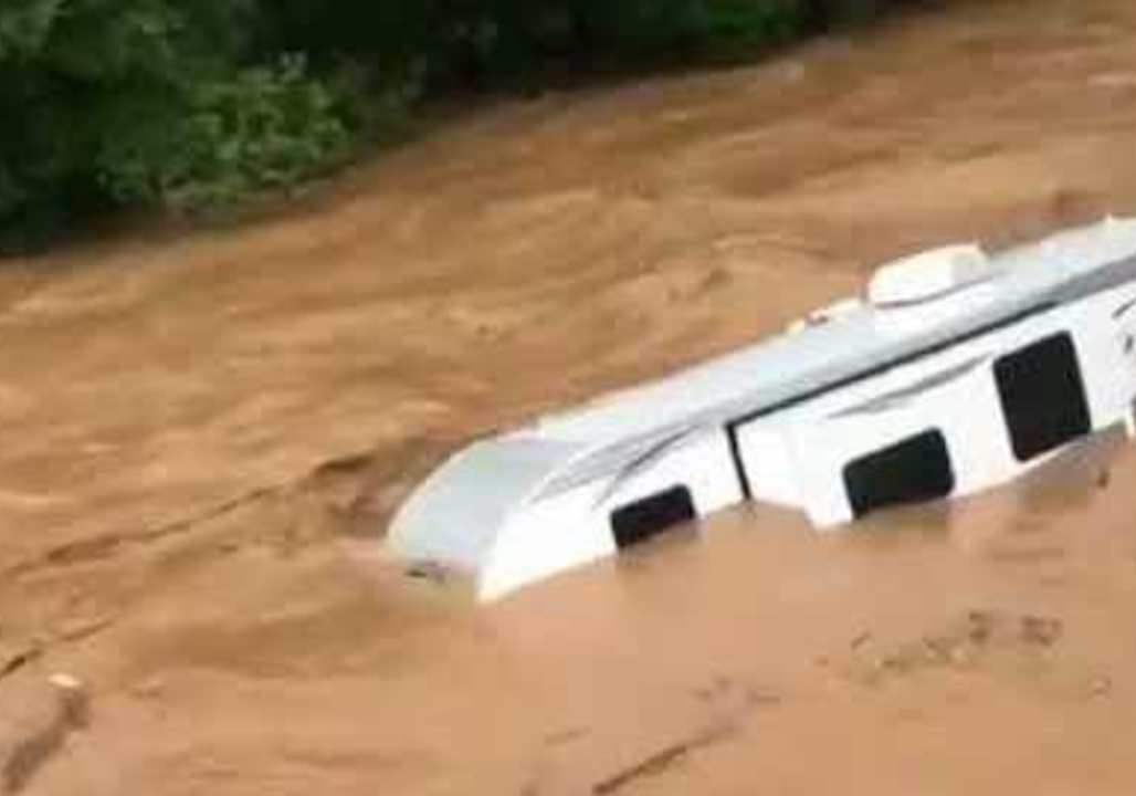 Camper Floats Down Flooded Pennsylvania Creek