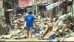 Philippines flooding: Displaced residents assess damage