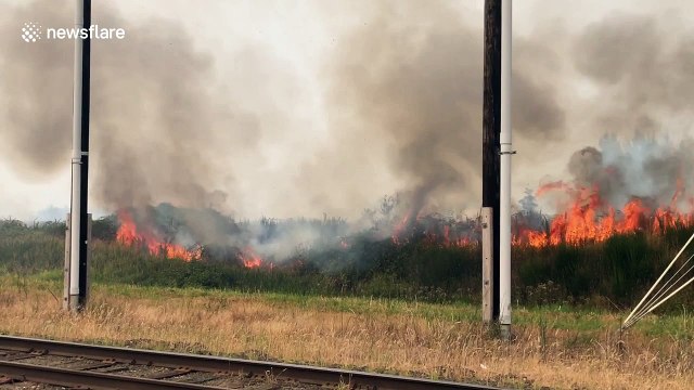Brush fire in southwest Washington state prompts road closures