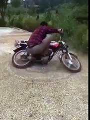 Umm - this is a silly motorbike trick!