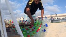 Palestinian fisherman makes boat out of 700 plastic bottles