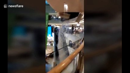 Ceiling collapses at Chinese mall after torrential rainfall