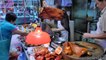 Hong Kong Street Food. Chopping Piglets, Ducks, Pigeons, Chickens in Sham Shui Po