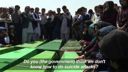 Afghans bury loved ones killed in Kabul blast