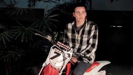 Alex Neustaedter Sits On A Dirt Bike For A Chat