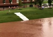 Oklahoma State University Students Dive Into Floodwaters After Storm Hits Campus