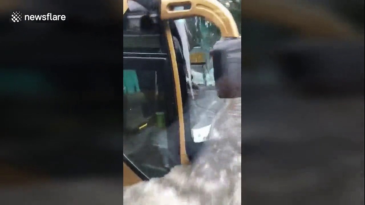 Hundreds of vehicles submerged in northern China floods