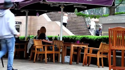 Openly Pulling chairs of unknown persons