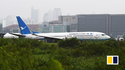 Chinese plane skids off Manila runway amid downpour