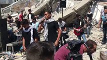 Palestinian Musicians Perform in the Rubble of Building Destroyed by Israeli Strikes