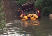 Car Trapped on Flooded Road in Watertown, Wisconsin