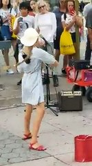 Street talent of a young girl In one of the market of Santa Monica California USA