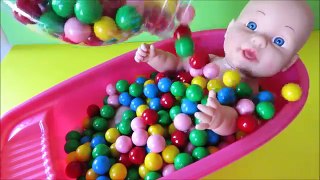 Baby doll gum balls bath surprise toys bathtime surprise eggs toy video