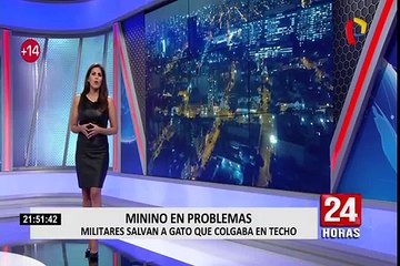 Militares salvan a gato que colgaba en techo