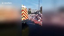 Major UK road closed after lorry crash sends thousands of Coke cans onto road