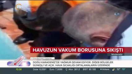 Havuzun vakum borusuna sıkıştı