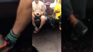 Kid and the phone at subway